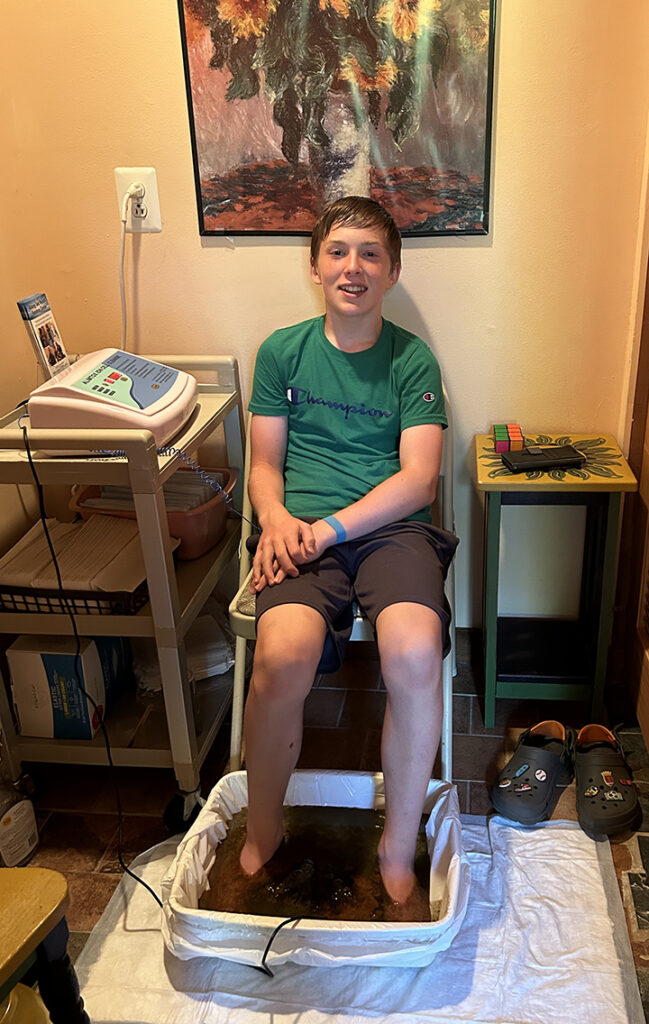 Mason Ransome enjoying a footbath at Allergy and Health Solutions Center in Medford, NJ